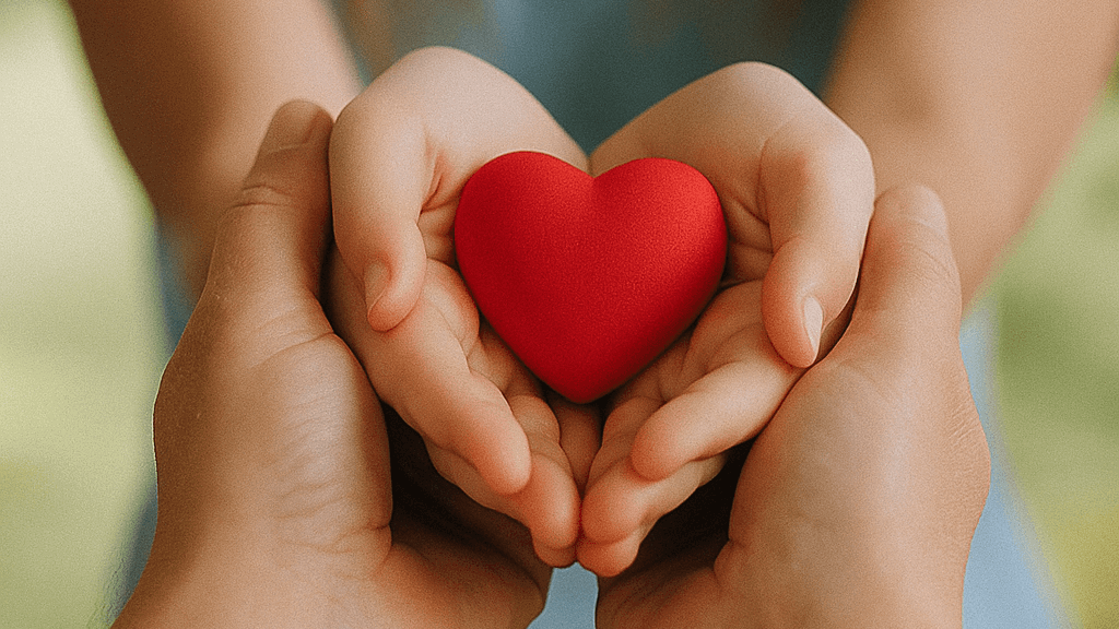A woman with crossed arms sits and smiles
